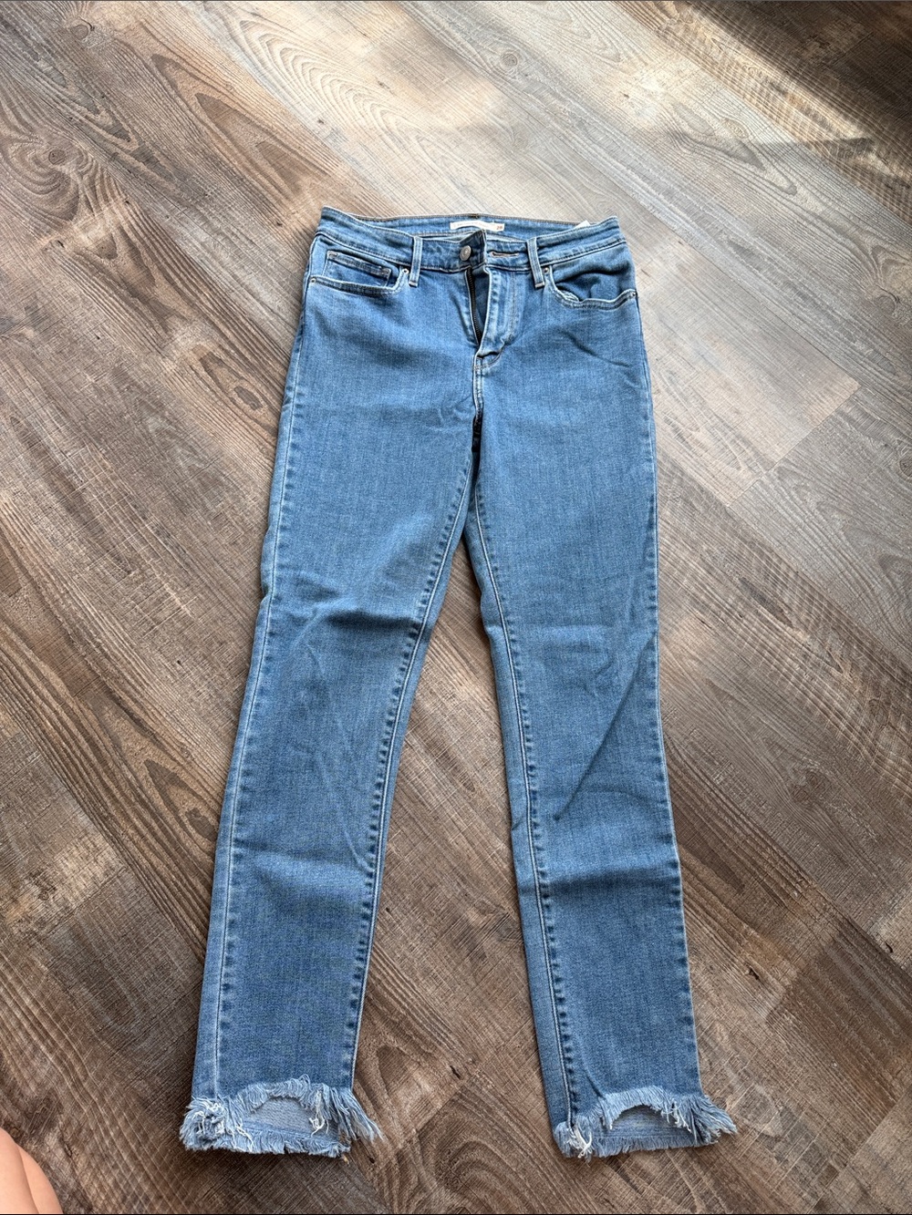 Levi's Light Blue Skinny Jeans with Frayed Ankles